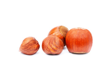 Group healty hazelnuts isolated on white background