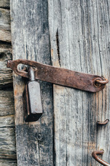 padlock on the old wooden door