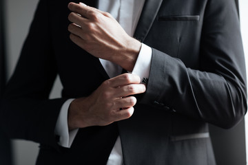 Obraz premium Cropped model in suit