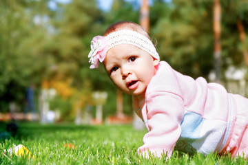 Little girl playing outdoors in the park