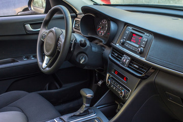 Modern car interior with smart phone