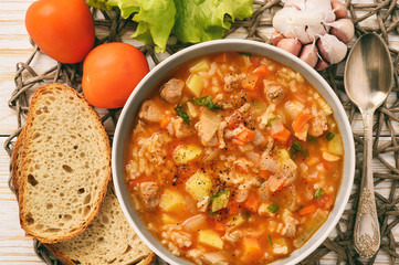 Nutrient soup with meat, rice and vegetables - mastava (uzbek kitchen).