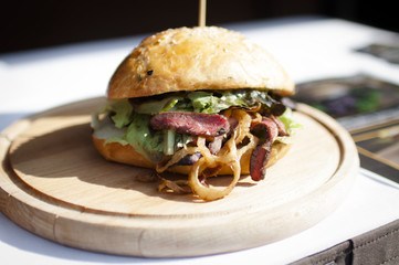 hamburger on wood plate
