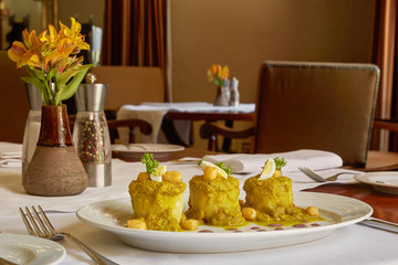 Traditional Peruvian Meal Called Ocopa Arequipena Served in a Re