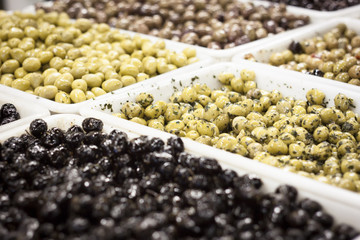 green and black olives on the market