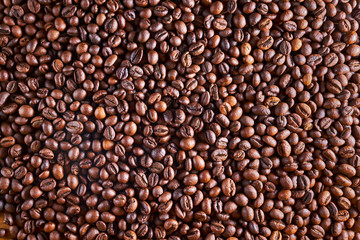 aromatic roasted coffe beans background 
