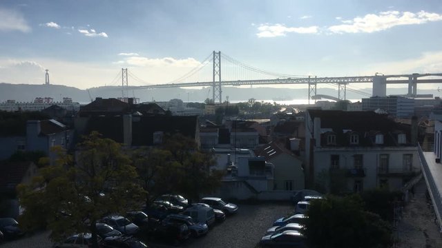 Famous 25th of April Bridge In Lisbon, Portugal. The 25 de Abril Bridge is a suspension bridge connecting the city of Lisbon to the municipality of Almada.