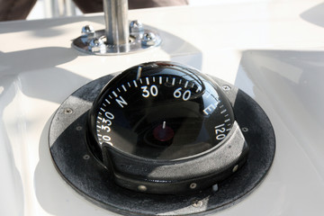 Compass on a sea fishing boat. Gyrocompass on the ship © okyela