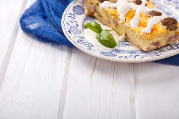 Quiche  Lorraine,a Traditional French Savoury an open Pie with Bacon and Mushrooms.Copy space. selective focus.