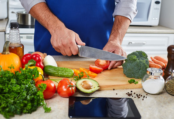 Chef man cooking in the kitchen.