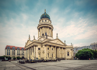 Fototapeta na wymiar View on German Cathedral on Gendarmenmarkt in Berlin, Germany, Europe, Vintage filtered style