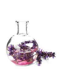 Obraz na płótnie Canvas Lavender flowers and glass vase isolated on white