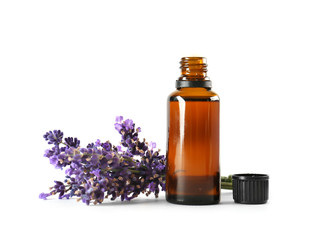 Bottle with aroma oil and lavender flowers isolated on white