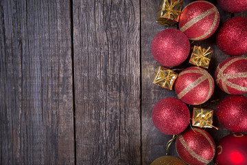 New year balls frame on rustic wooden background