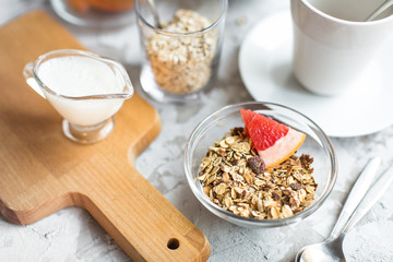 healthy breakfast: granola in bowl with coffe