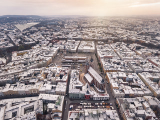 Fototapeta Drone aerial winter view of Krakow market square, with snow. Poland, Europe. obraz