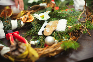 The process of making handicraft christmas wreath