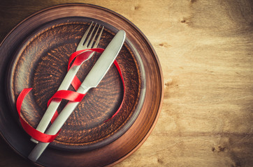 Rustic Table Setting for Christmas Eve or Valentine's Day.