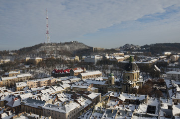 Winter panorama of Lviv covered by snow, Ukraine.Lviv or Lvov, Eastern Ukraine - the view of the city from the city hall clock tower.