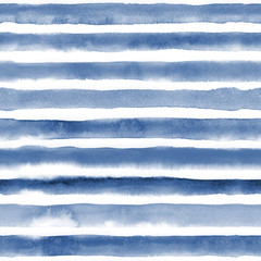 Beautiful seamless pattern with blue watercolor stripes. hand