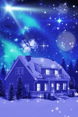 Fototapeta premium Composite image of illuminated turquoise house covered in snow