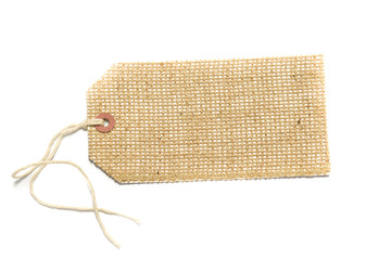 Burlap tag or label with attached string on white with room for text