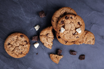 Double chocolate chip cookies on dark background