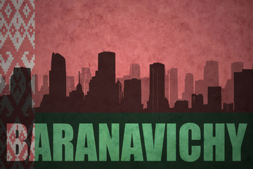 abstract silhouette of the city with text Baranavichy at the vintage belarus flag