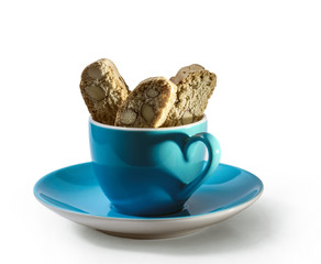 Caffee and cantuccini with shadow in heart shape