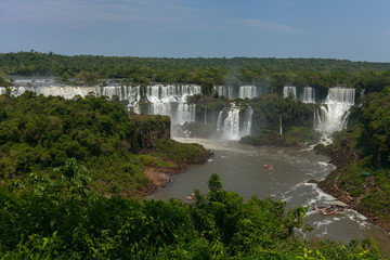 Fototapeta na wymiar Iguazu Falls in the jungle. Natural Wonder of the World