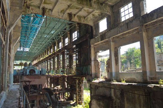 Abandoned, destroyed by war and overgrown machinery of Tkvarcheli power plant 
