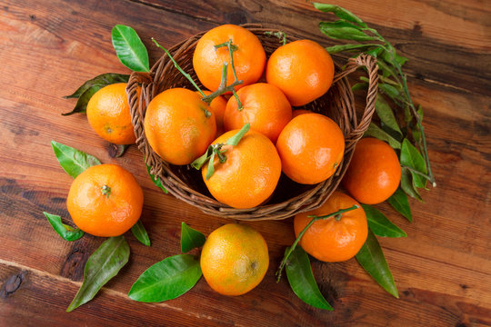 Mandarins tangerines basket. Top view.