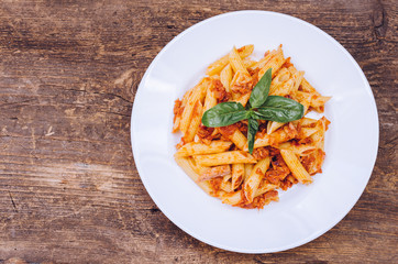 Penne pasta with tuna and basil
