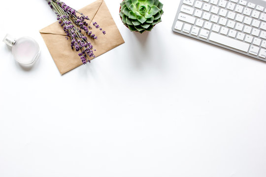 Female White Desktop With Flowers Top View