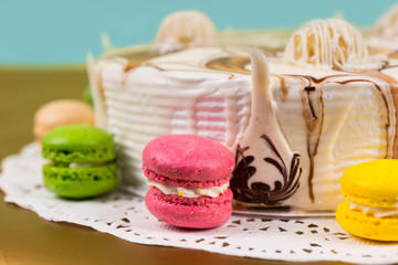 Close up of appetizing cake with different chocolate ornaments n