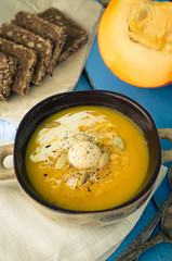 Pumpkin soup with cream and seeds
