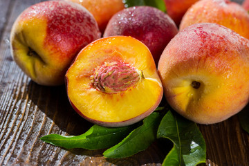 Fresh peaches, Peach close up fruit background, peach on wood background,sweet peaches, group of peaches,Peaches pattern texture fruit market peach background