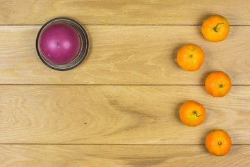 Christmas clementines isolated on a wooden background