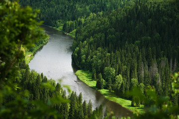 Fototapeta premium Beautiful wild river bend in the woodland, Siberia, the Urals, Russia