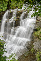 Fototapeta na wymiar Cascade falls with rocks
