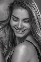 Natural young woman smiling.