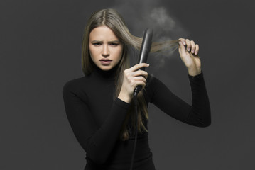 hair damaged by hot hair iron, hair care concept