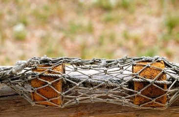 Float in the fishing net.Closeup