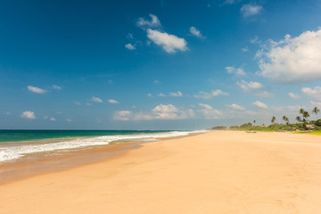 Fototapeta na wymiar Tropical beach with boat in Sri lanka.