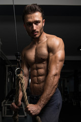 Bodybuilder Exercising Triceps