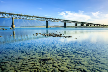 Fototapeta na wymiar Bridging the gap, Haast Bridge, Haast River, Westland, New Zealand