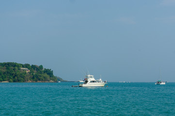 Beautiful landscape seaview with boat at beach of Laem Panwa Cape famous attractions in Phuket island, Thailand