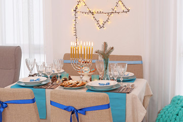 Interior of beautiful living room decorated for Hanukkah