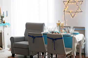 Interior of beautiful living room decorated for Hanukkah