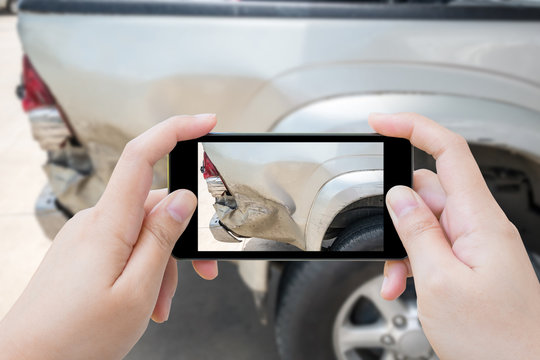 woman using mobile smartphone take photo car crash accident